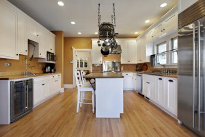 Kitchen in upscale home with gold colored walls